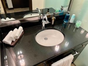 Vannituba majutusasutuses Boutique Suites 3 min walk to beach