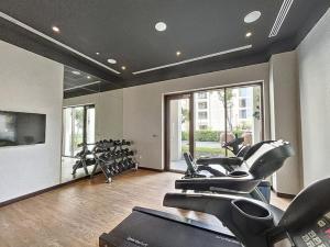 a gym with a bunch of exercise bikes in it at Summer at Creek Beach - Vacationer in Dubai