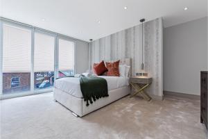 מיטה או מיטות בחדר ב-Creative stylings 2 Bedroom in Wembley Park