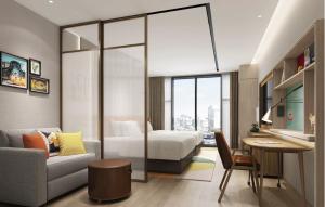 Home2 Suites By Hilton Hotel Guangzhou Baiyun International Airport Branch - Free Shuttle Bus to Guangzhou Baiyun International Airport & Free Deliver Service to Canton Fair Complex During Canton Fair Periodにあるシーティングエリア