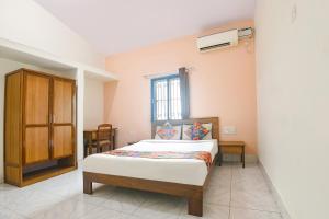 Voodi või voodid majutusasutuse FabExpress Joey's Place - Nr Panjim toas