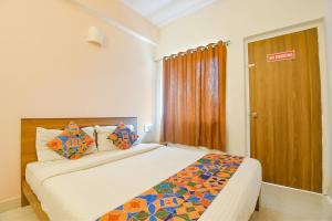 Voodi või voodid majutusasutuse FabExpress Joey's Place - Nr Panjim toas