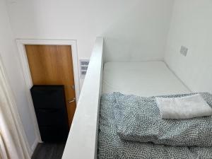 A bed or beds in a room at City Centre 1