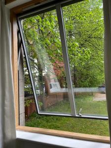 an open window with a view of a yard at City Centre 1 in Manchester