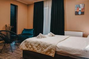 Voodi või voodid majutusasutuse Holiday Home toas