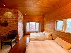 Ein Bett oder Betten in einem Zimmer der Unterkunft No. 36 Farm