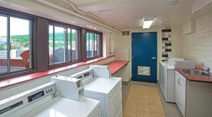 A cozinha ou cozinha compacta de L'Appartement Hôtel