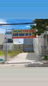 a sign that reads china north yam army cdo dab ay do at Nhà nghỉ Vân Anh in Ấp Rạch Mẹo