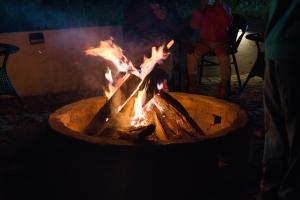 a fire pit with a bunch of fire in it at Dharti The Glamping Haven in Darjeeling