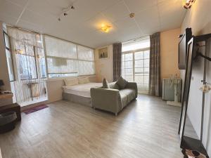 Katil atau katil-katil dalam bilik di Zhixinyuan B&B