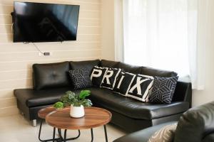 TV a/nebo společenská místnost v ubytování Prix Hotel