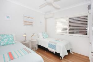 A bed or beds in a room at Windmill 3