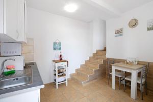 Kuchyň nebo kuchyňský kout v ubytování Apartamento La Morena 3a