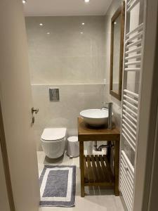 Ein Badezimmer in der Unterkunft Miltilon