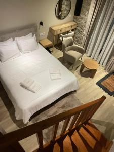 Ein Bett oder Betten in einem Zimmer der Unterkunft Miltilon
