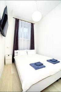 Posteľ alebo postele v izbe v ubytovaní Atlas Hotel