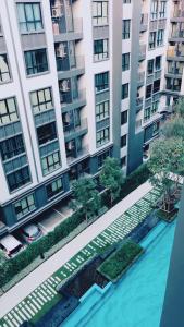 an aerial view of a large apartment building at KensingtoN Laemchabang-Sriracha, Special rate for monthly rent, Cozy Style of Living and near Kasetsart University in Ban Ao Udom