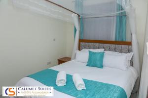 Postel nebo postele na pokoji v ubytování Calumet Suites airbnb and accommodation