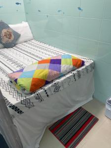 Voodi või voodid majutusasutuse Relaince lucky MIRADOR MANSION toas