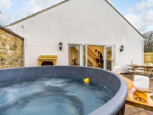 a hot tub in the backyard of a house at 1 Bed in Bishop Auckland 86812 in Byers Green