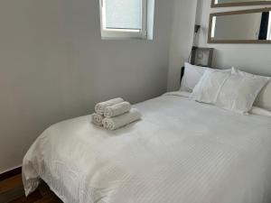Posteľ alebo postele v izbe v ubytovaní TOP STUDIO penthouse IMITTOU