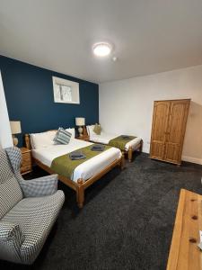 Ein Bett oder Betten in einem Zimmer der Unterkunft Boscombe Spa Hotel
