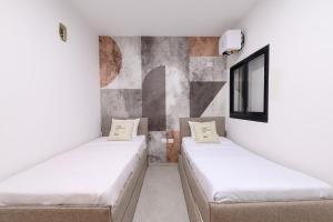 Postel nebo postele na pokoji v ubytování פנינת הנוף אילת DreamyRent Pearl Of The Landscape + 9 fotografií