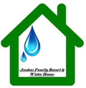 Anuhas Family Resort & Water House في أنورادابورا: سهم اخضر مع قطرة ماء