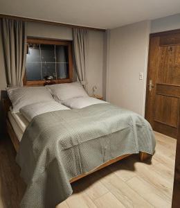 Postel nebo postele na pokoji v ubytování Haus Franka