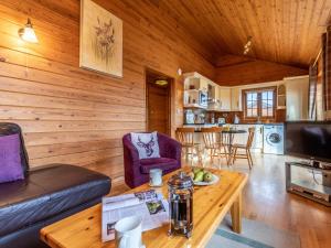 a living room with a couch and a table at 2 Bed in Clovelly 00362 in Clovelly