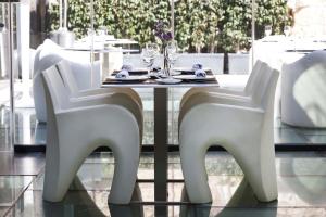 Posedenie v ubytovaní Olivia Plaza Hotel