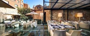Reštaurácia alebo iné gastronomické zariadenie v ubytovaní Olivia Plaza Hotel