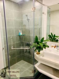 Kylpyhuone majoituspaikassa NEW MILANO HOTEL & APARTMENT