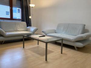 Ein Sitzbereich in der Unterkunft Ferienwohnung Brenderweg