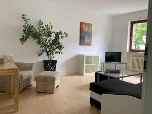 Ein Sitzbereich in der Unterkunft Ferienwohnung Brenderweg