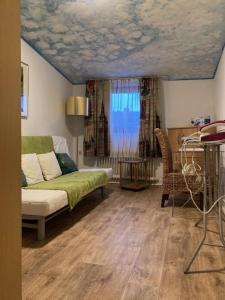 O zonă de relaxare la Ferienwohnung Brenderweg