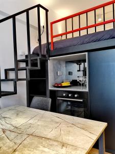 a room with two bunk beds and a table at Unique City Centre Apartments in Nicosia