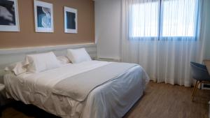 Cama o camas de una habitación en La Hospedería - El Provencio