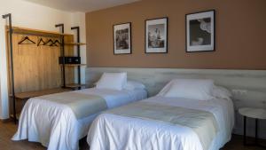 Cama o camas de una habitación en La Hospedería - El Provencio
