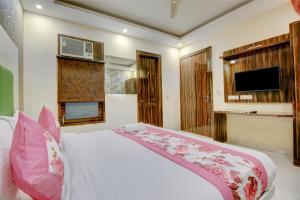 TV o dispositivi per l'intrattenimento presso Smart Plaza Hotel