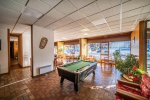 a billiard room with a pool table in it at Les Mouflons 1500 in Taninges