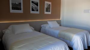 Cama o camas de una habitación en La Hospedería - El Provencio