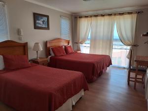 Postel nebo postele na pokoji v ubytování Hotel Solaris