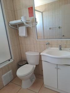 Koupelna v ubytování Hotel Solaris