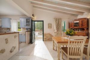 A kitchen or kitchenette at Villa Magnolia Corfu