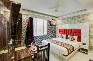 Postel nebo postele na pokoji v ubytování Smart Plaza Hotel + 37 fotografií