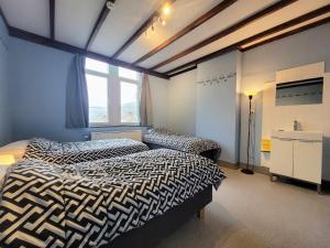 Gîte de Groupe de la Semoisにあるベッド