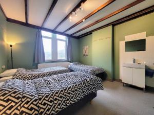 Gîte de Groupe de la Semoisにあるベッド