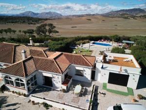 an aerial view of a house with a swimming pool at Stunning Villa Felipe, with private pool & hot tub in Almogía