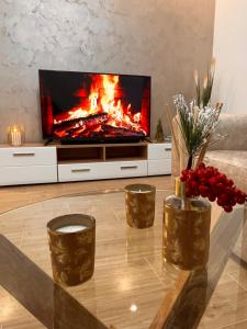 Μια τηλεόραση ή/και κέντρο ψυχαγωγίας στο Reset Apartman Divčibare